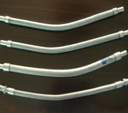 Stainless steel woven bellows assembly.